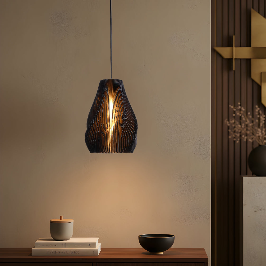 Matte black table lamp with a circular form and soft glow