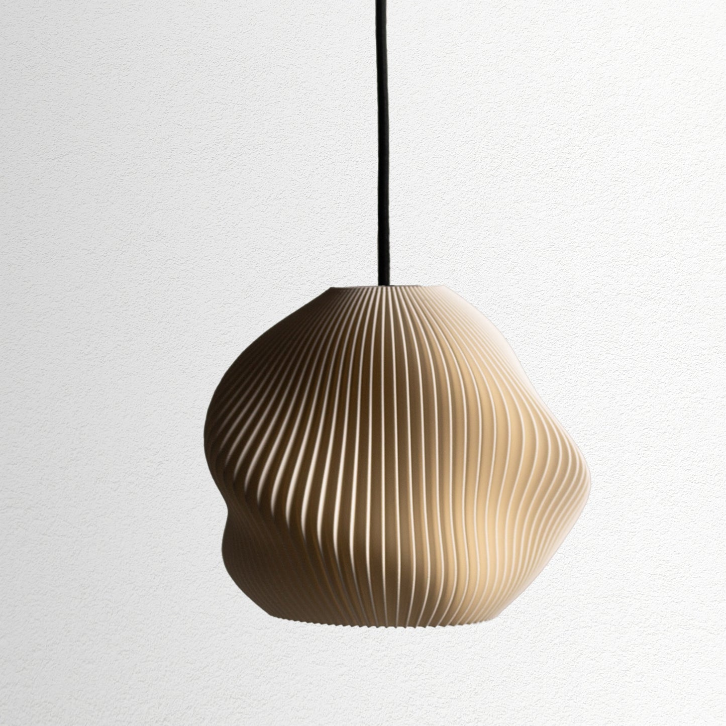 Neutral table lamp with a smooth rounded shape and warm glow