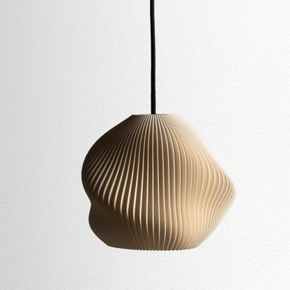 Neutral table lamp with a smooth rounded shape and warm glow