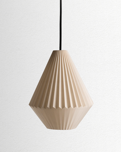 Pendant lamp with folded detailing and soft ambient glow