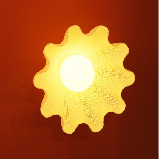 Statement ceiling light with refined fin-like structure