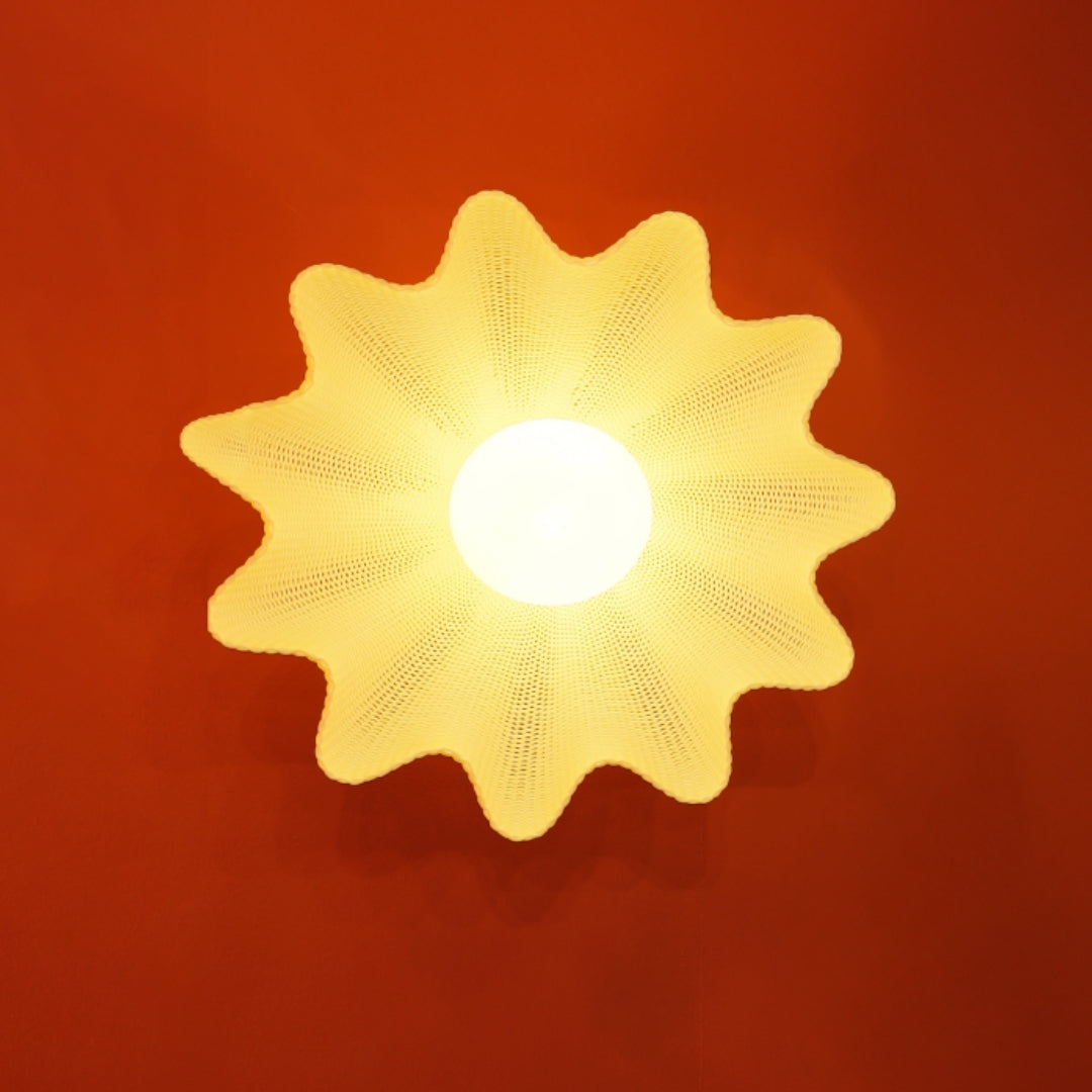 Pendant lamp with layered fin structure and soft ambient glow