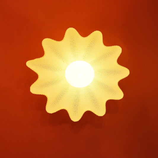 Pendant lamp with layered fin structure and soft ambient glow
