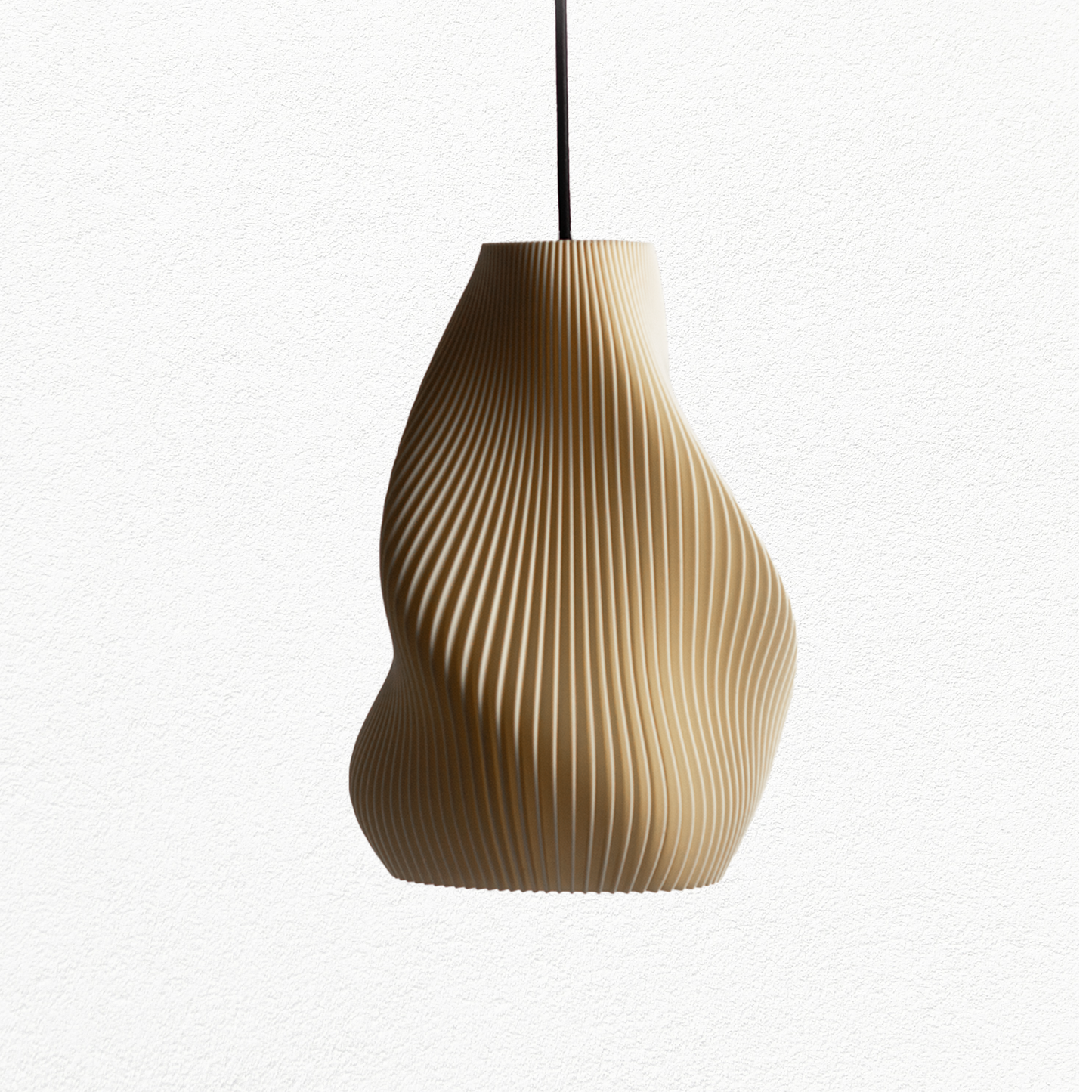 Neutral toned table lamp with a smooth silhouette and soft glow