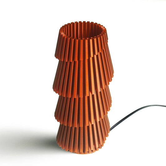 Neutral table lamp with a defined form and warm glow