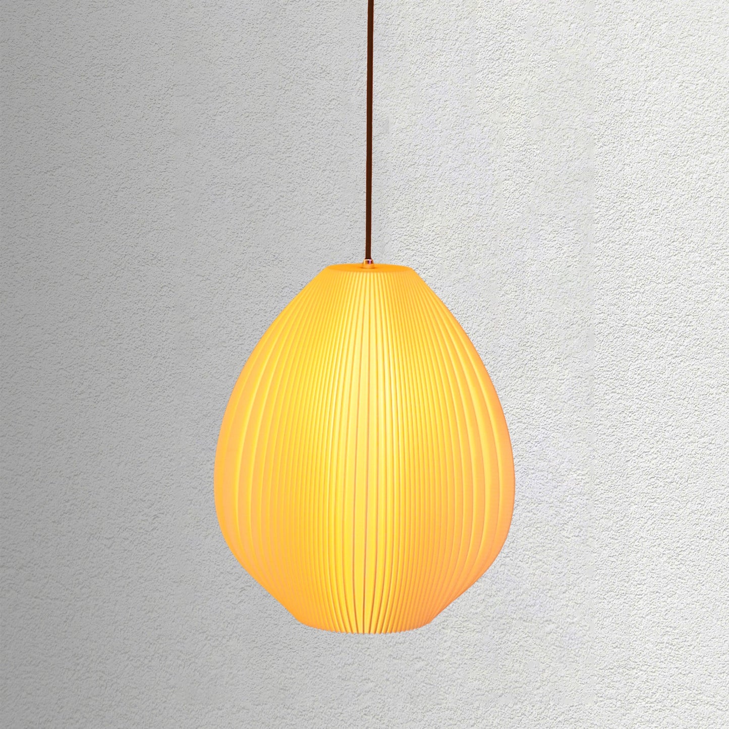 Neutral table lamp with a smooth flowing shape and soft glow