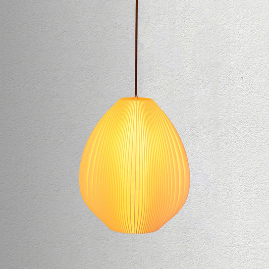 Neutral table lamp with a smooth flowing shape and soft glow
