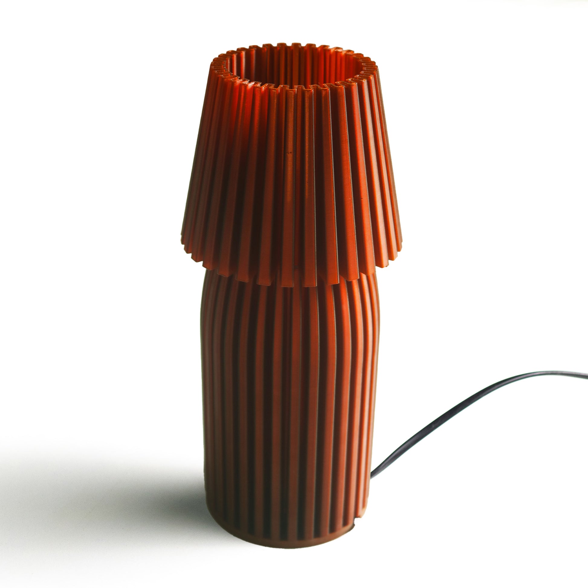 Neutral table lamp with a sleek form and soft warm glow