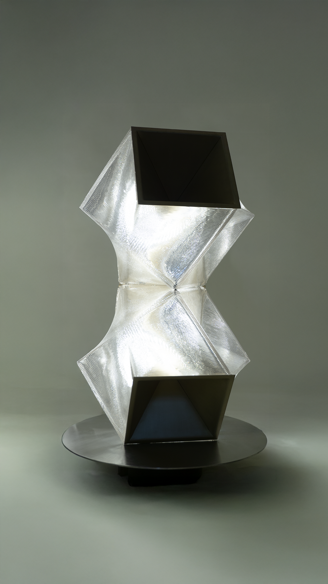 Statement floor lamp with layered geometric detailing